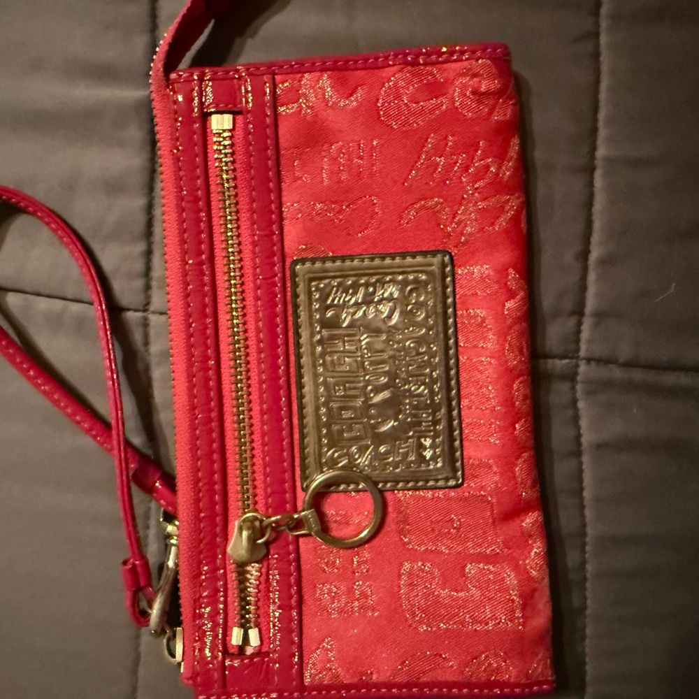 Coach Pink Wristlet Clutch with Textured Design